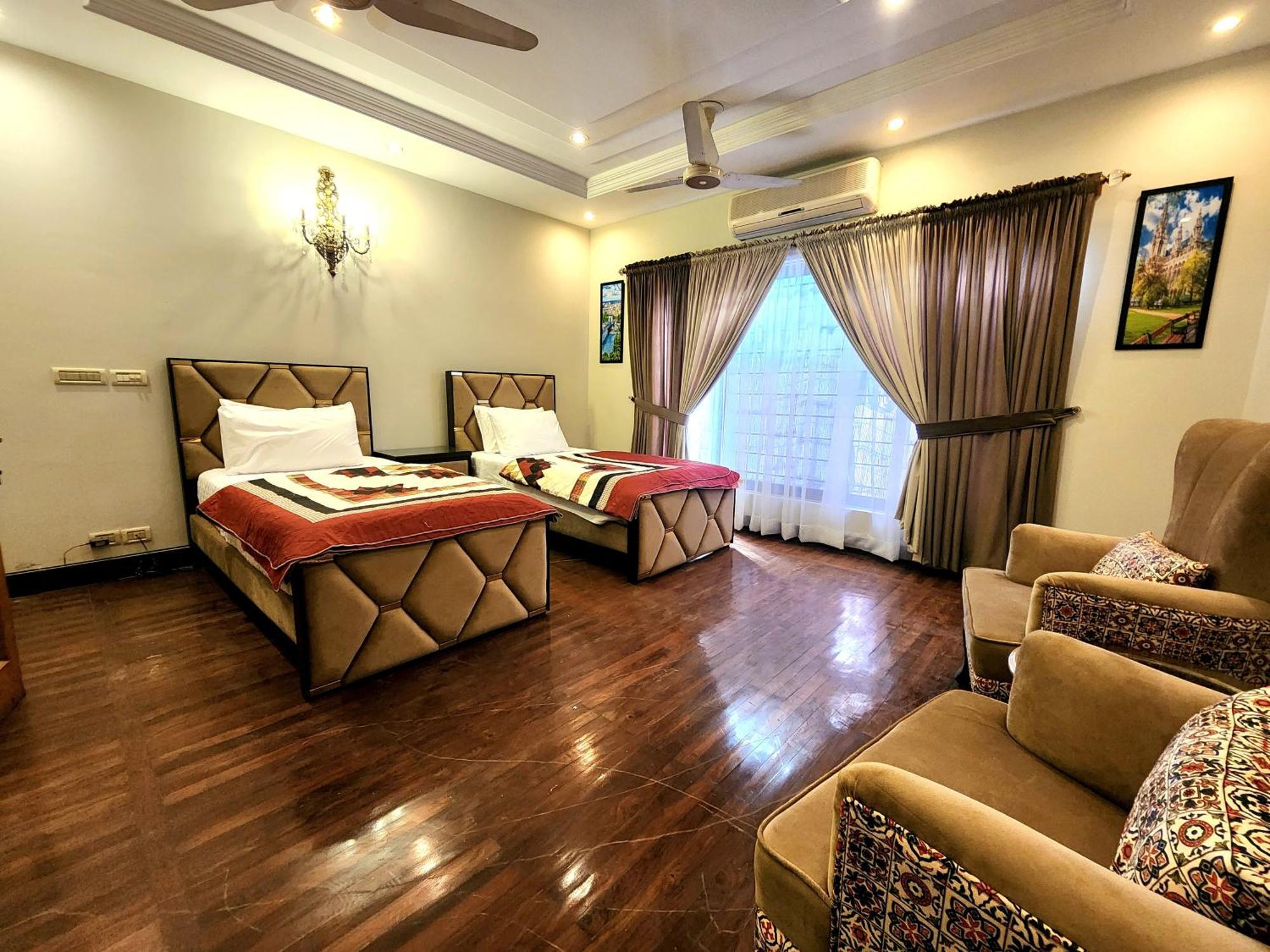 The Millenial Apartments & Suites Bahria Town 拉瓦尔品第 客房 照片