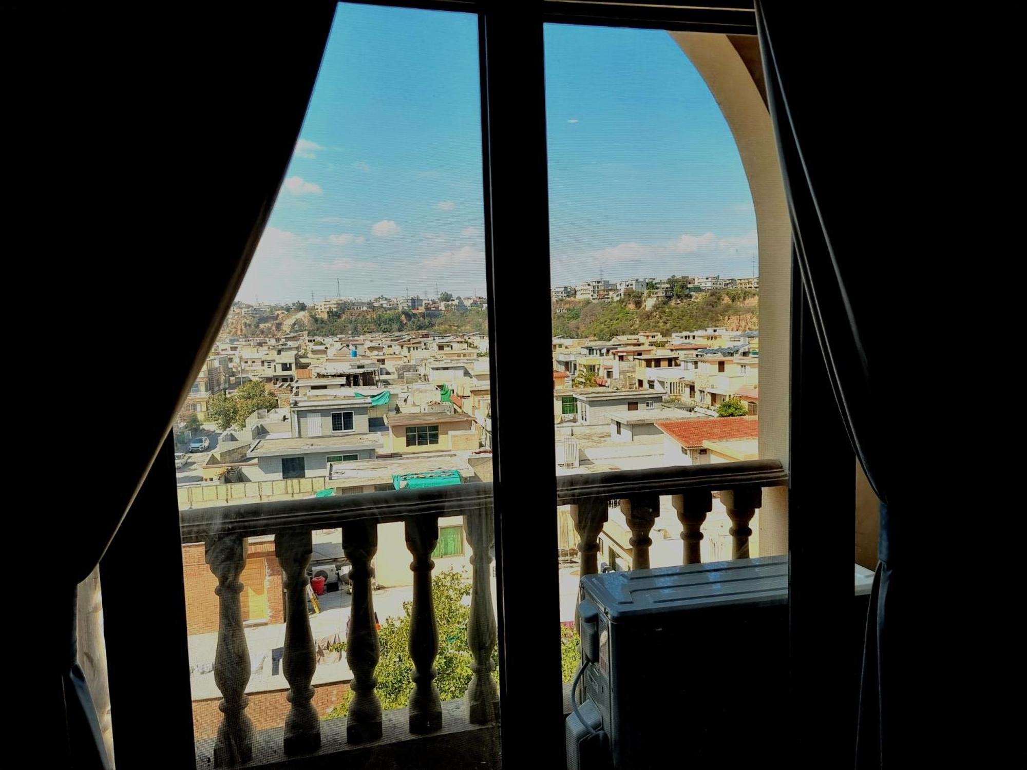 The Millenial Apartments & Suites Bahria Town 拉瓦尔品第 客房 照片
